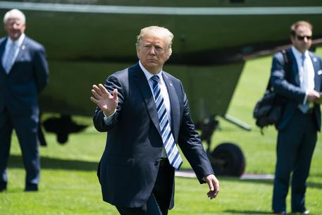 Trump returns to the White House from Navy Graduation