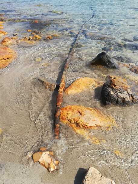 Carloforte, tubo in spiaggia Girin