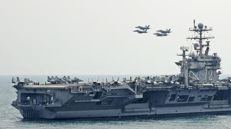The US deploys carrier strike group to Middle East as 'warning' to Iran
