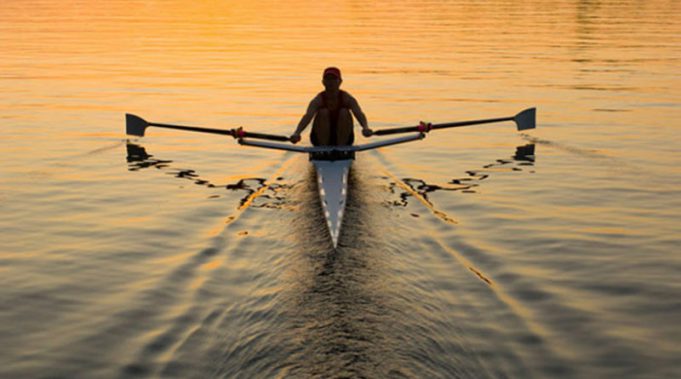 Single Rower In Sunrise