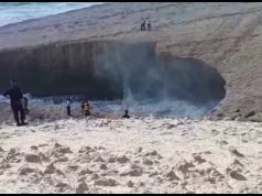 Scatta foto e precipita in mare: non ancora identificato