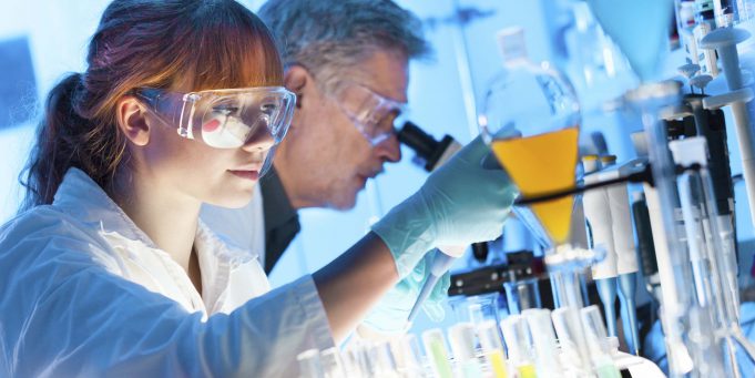 Health care professionals in lab.